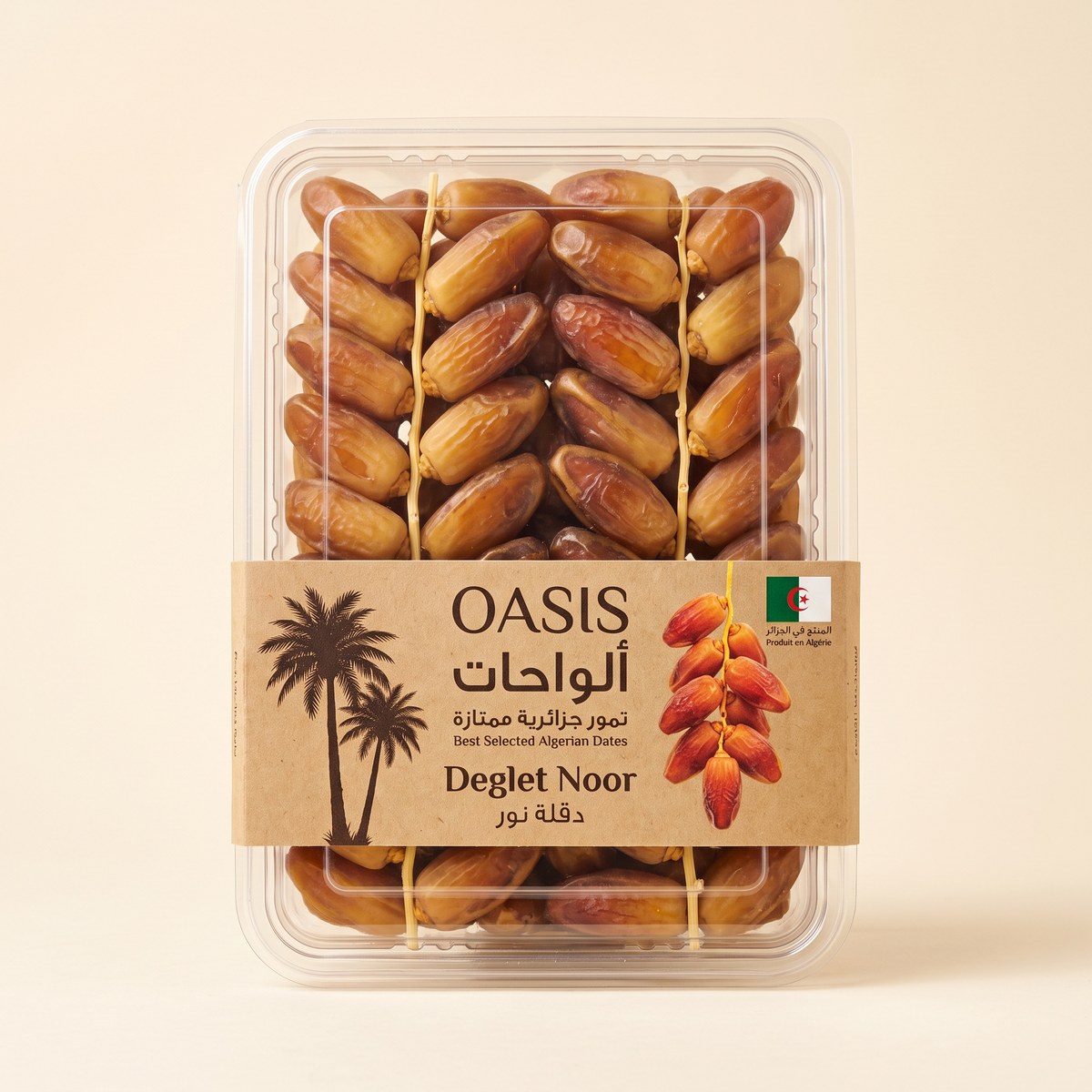 1 kg clear plastic display box of Algerian Deglet Noor dates on the bunch with a kraft paper sleeve