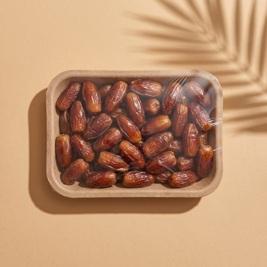 500 g film-sealed fibre tray of loose rehydrated Algerian Deglet Noor dates